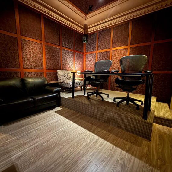 Film and TV 5.1 surround mixing suite with Pro Tools Ultimate, 86 inch 4K LCD TV, and professional client seating