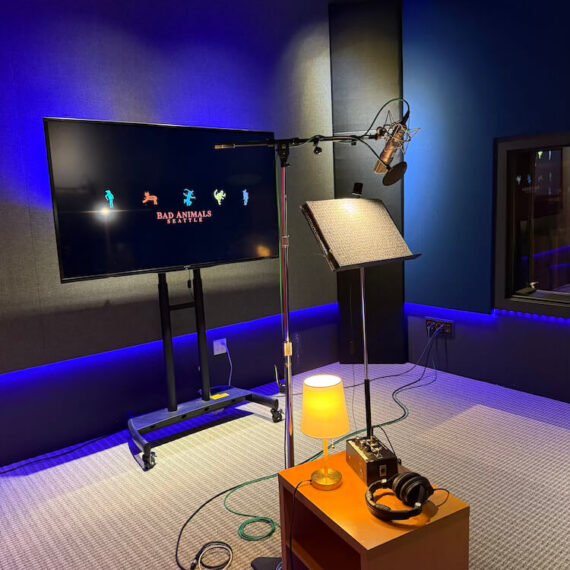 Professional voiceover recording suite with Sennheiser MKH416, vintage Neumann U87, Neumann TLM103, and Sanken COS-11D microphones